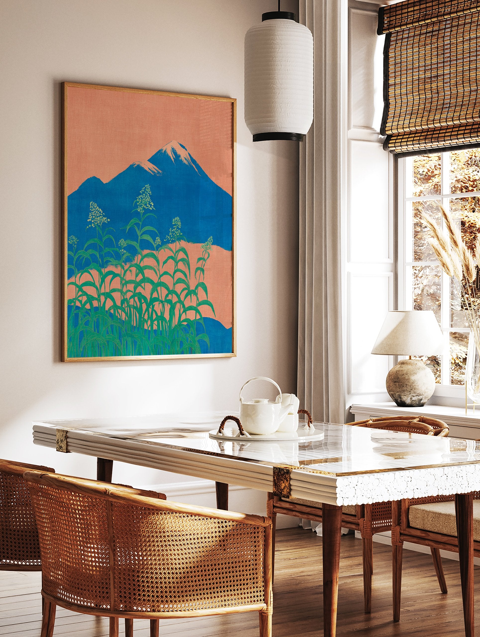 Japanese wall art depicting Mount Fuji, an orange sky, and lush green botanical plants with small white flowers in the foreground. - Image 2