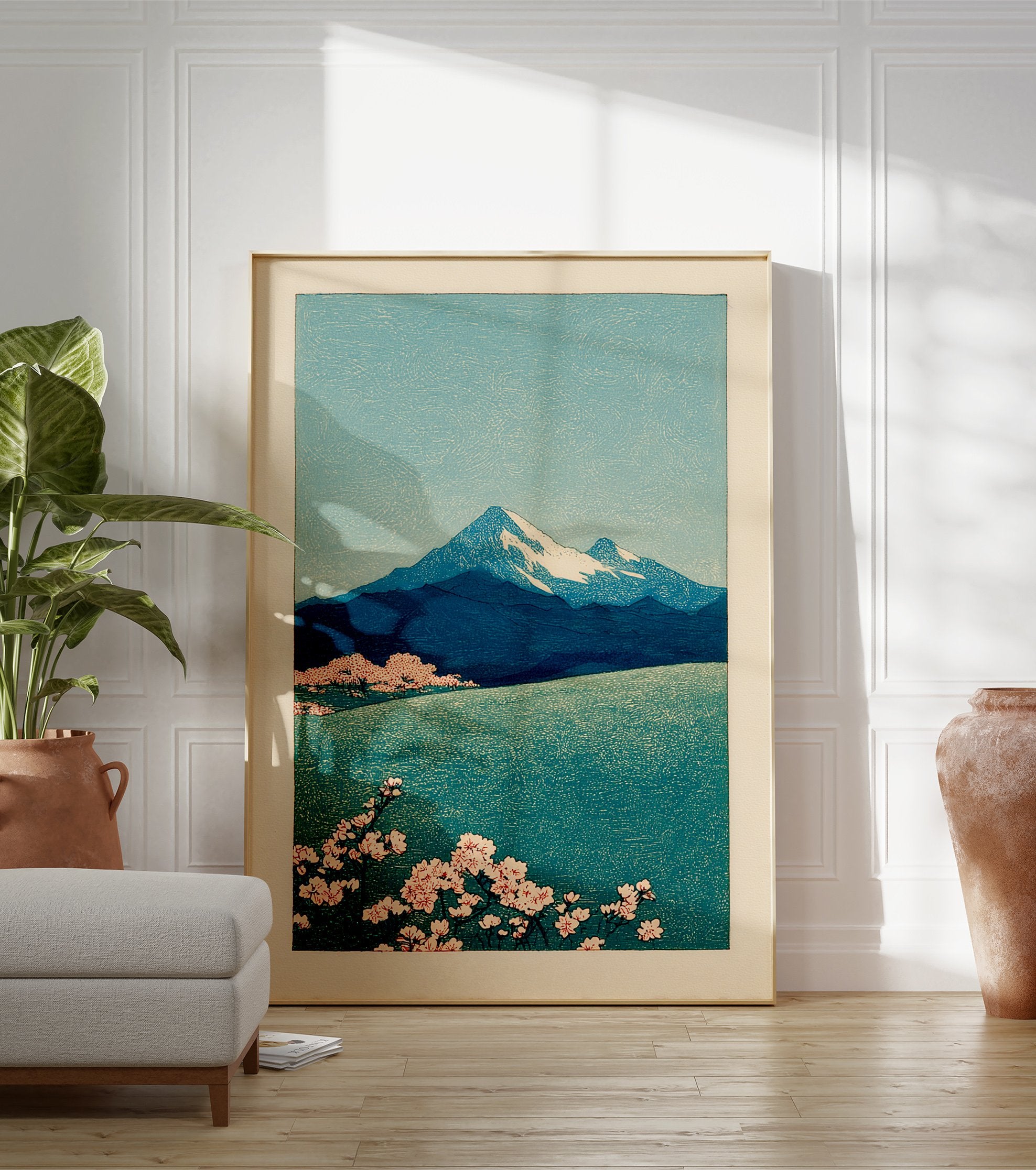 Japanese landscape wall art featuring Mount Fuji, a lake, and pink cherry blossoms in a traditional woodblock print style. - Image 3