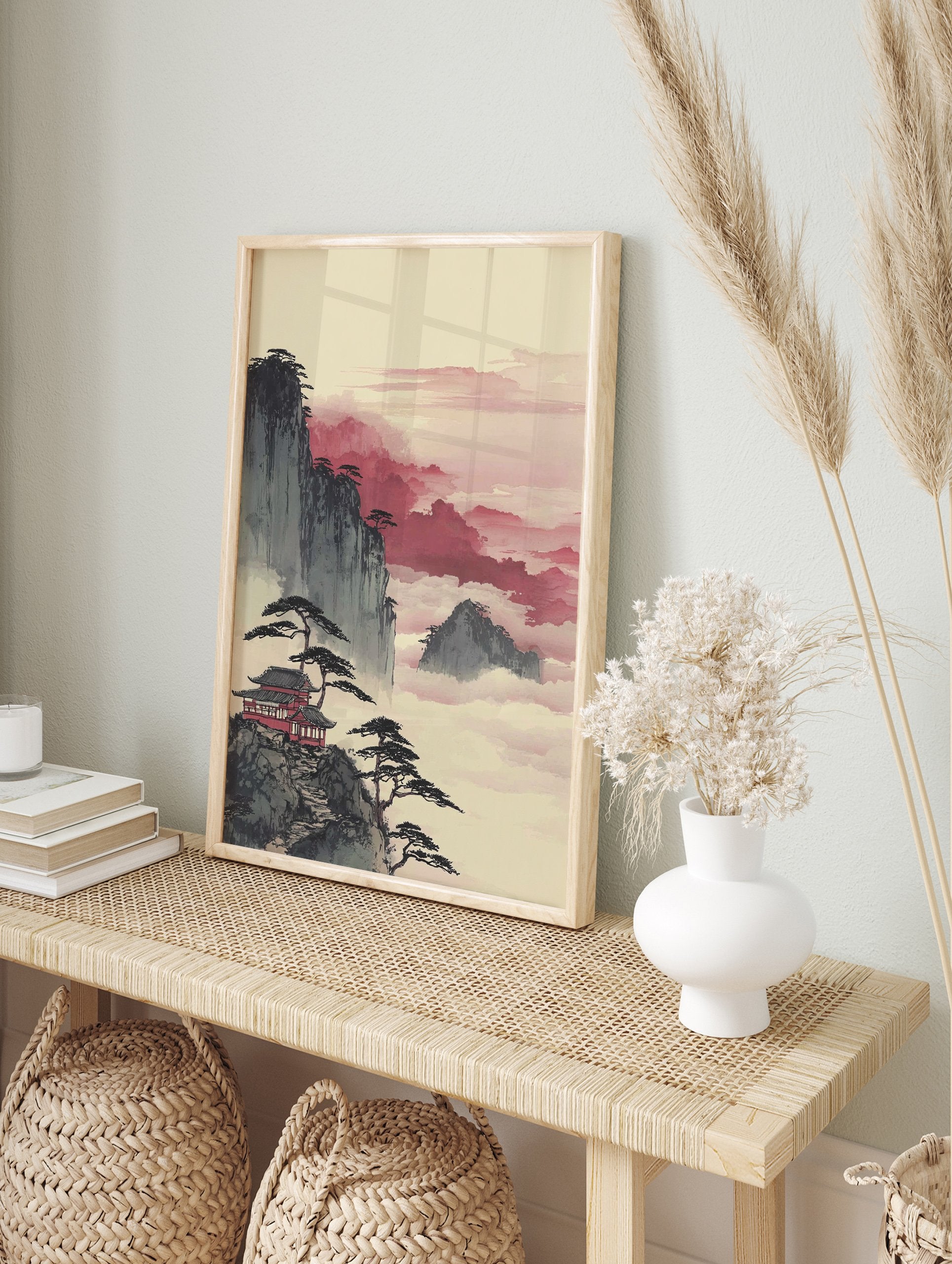 Japanese wall art depicting a red temple on a mountain cliff with pine trees amidst misty, pinkish-red clouds. - Image 3