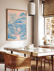 Japanese Wall Art print of a pink and blue pagoda temple in a serene mountain landscape with pine trees. - Image 2
