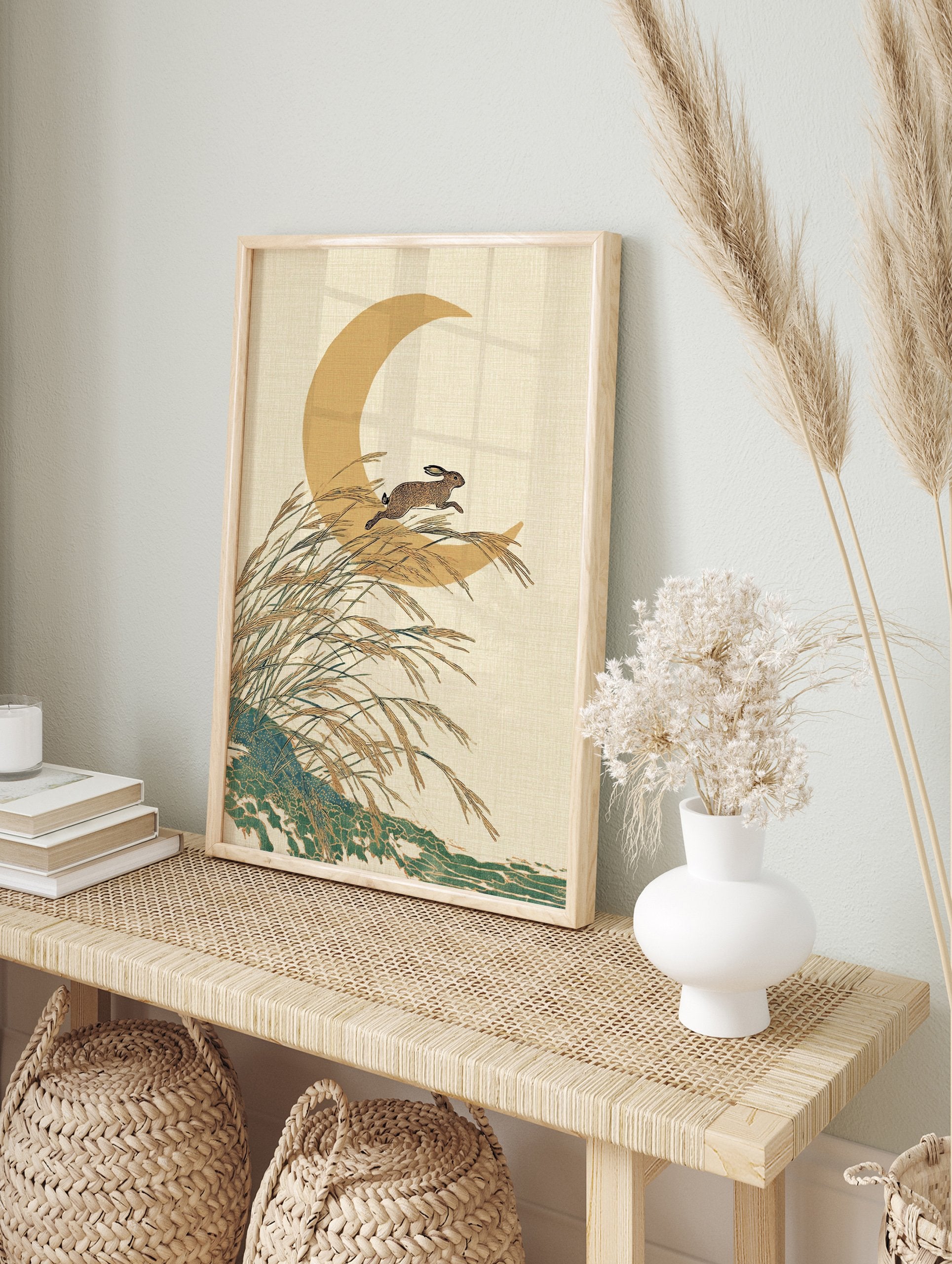 Japanese wall art print with a brown rabbit jumping over golden pampas grass in front of a crescent moon on a textured beige background. - Image 3