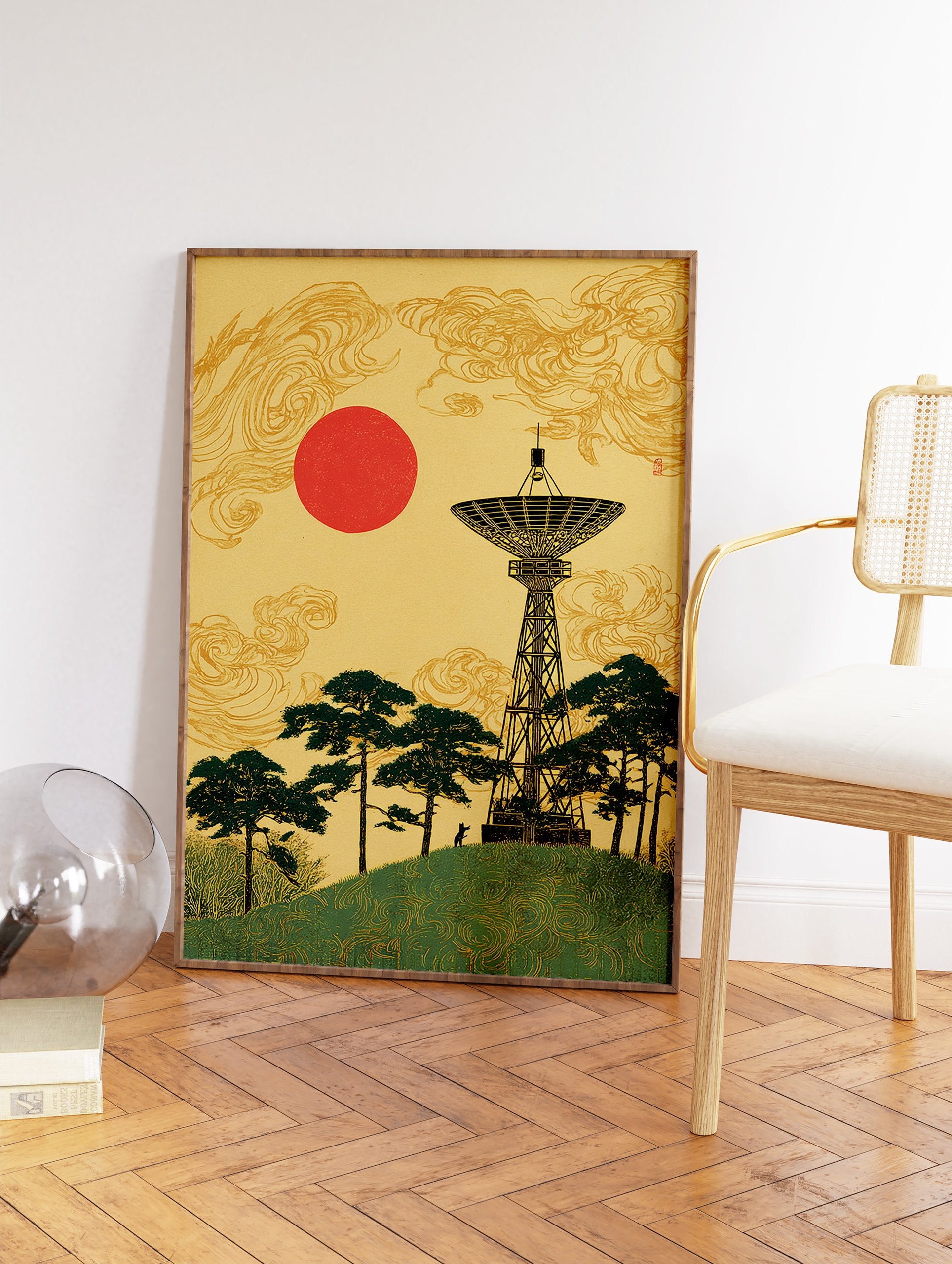 Japanese wall art print with a black radio telescope, green pine trees, a red sun, and golden clouds on a yellow background. - Image 2