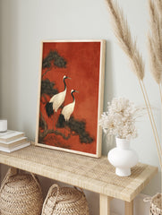 Japanese Wall Art print with two white red-crowned cranes on a pine branch against a textured red background. - Image 3