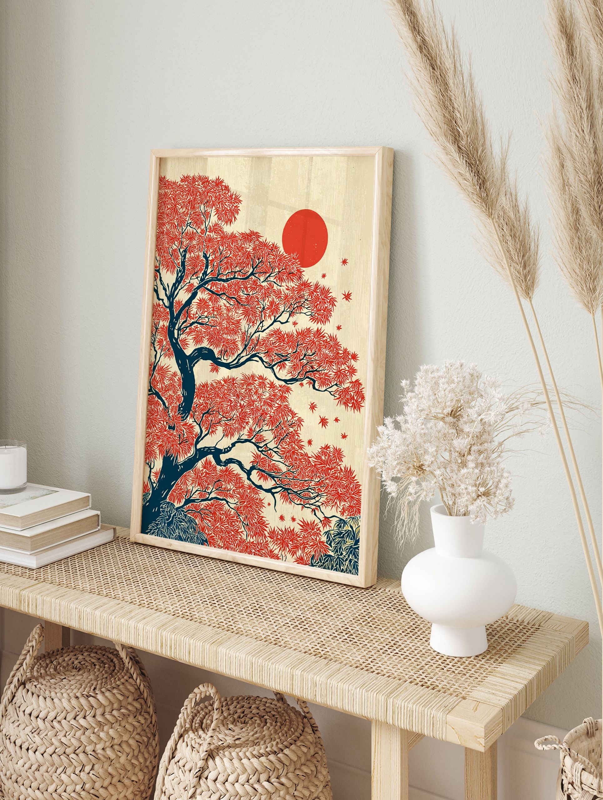 Japanese wall art print depicting a vibrant red maple tree with dark blue branches and a large red sun on a cream background. - Image 3