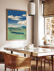 Japanese landscape wall art print with a train winding through green rice fields, mountains, and a blue sky with white clouds. - Image 2