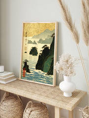Japanese Wall Art depicting a serene coastal landscape with islands, green mountains, and blue water under a golden sky. - Image 3