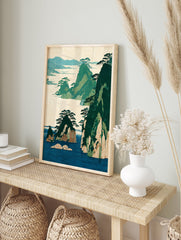 Traditional Japanese landscape art print featuring green islands, mountains, and pine trees in a blue sea and beige sky. - Image 3