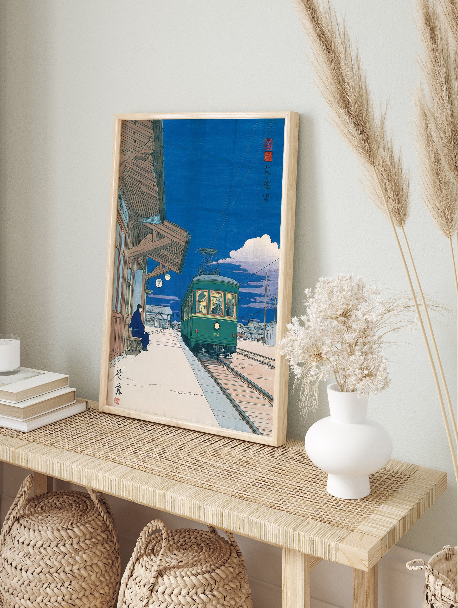Japanese Wall Art print of a green tram at a station platform at night with a person sitting on a bench. - Image 3