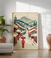 Japanese Wall Art print of a person in a red kimono with an umbrella walking down a snowy street with traditional houses and mountains. - Image 3