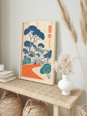 Japanese woodblock style wall art print featuring a blue and teal village landscape with an orange river and bridge. - Image 3
