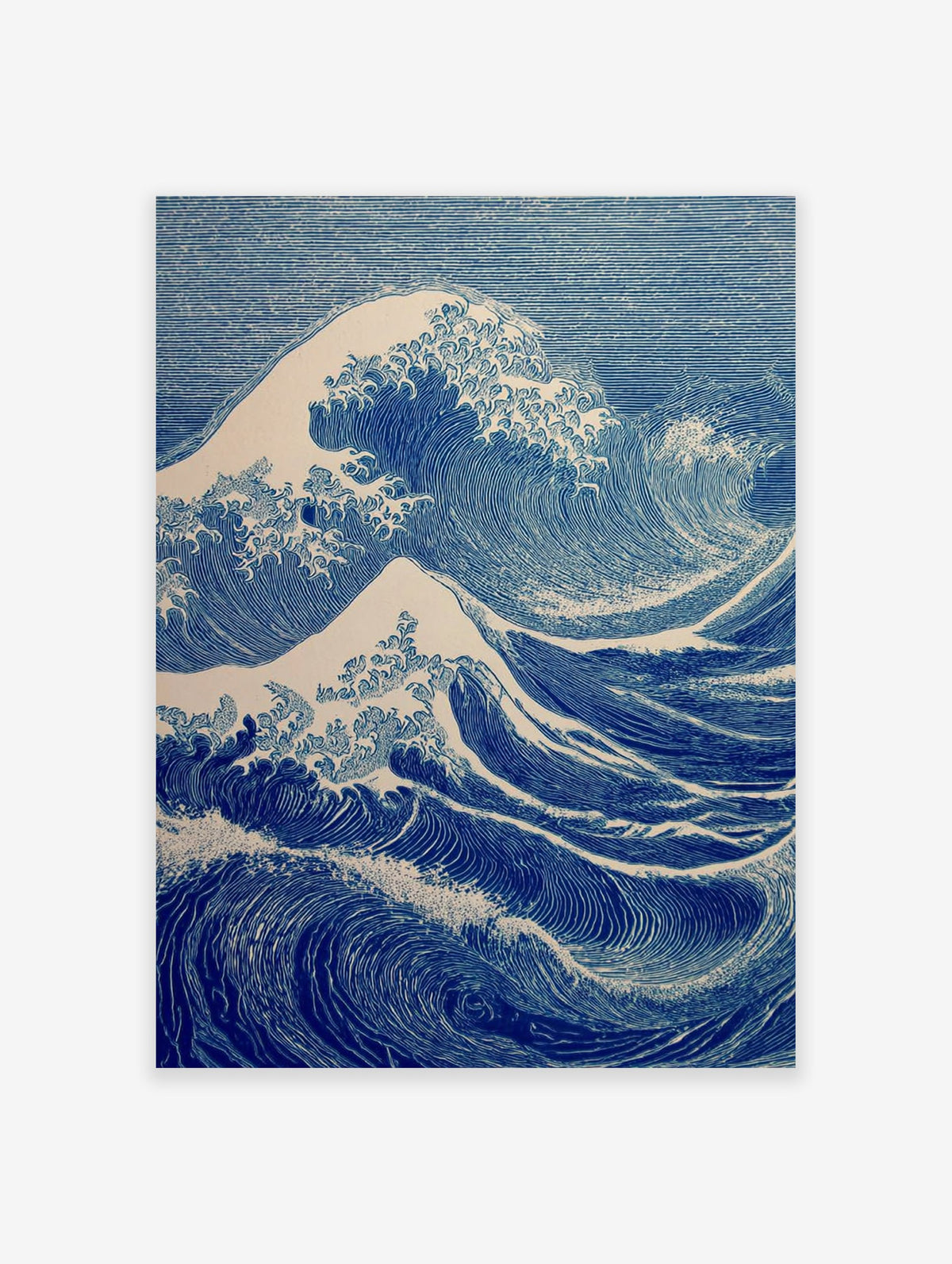 Blue Japanese Ukiyo-e style ocean wave art print with white foam on a white background.