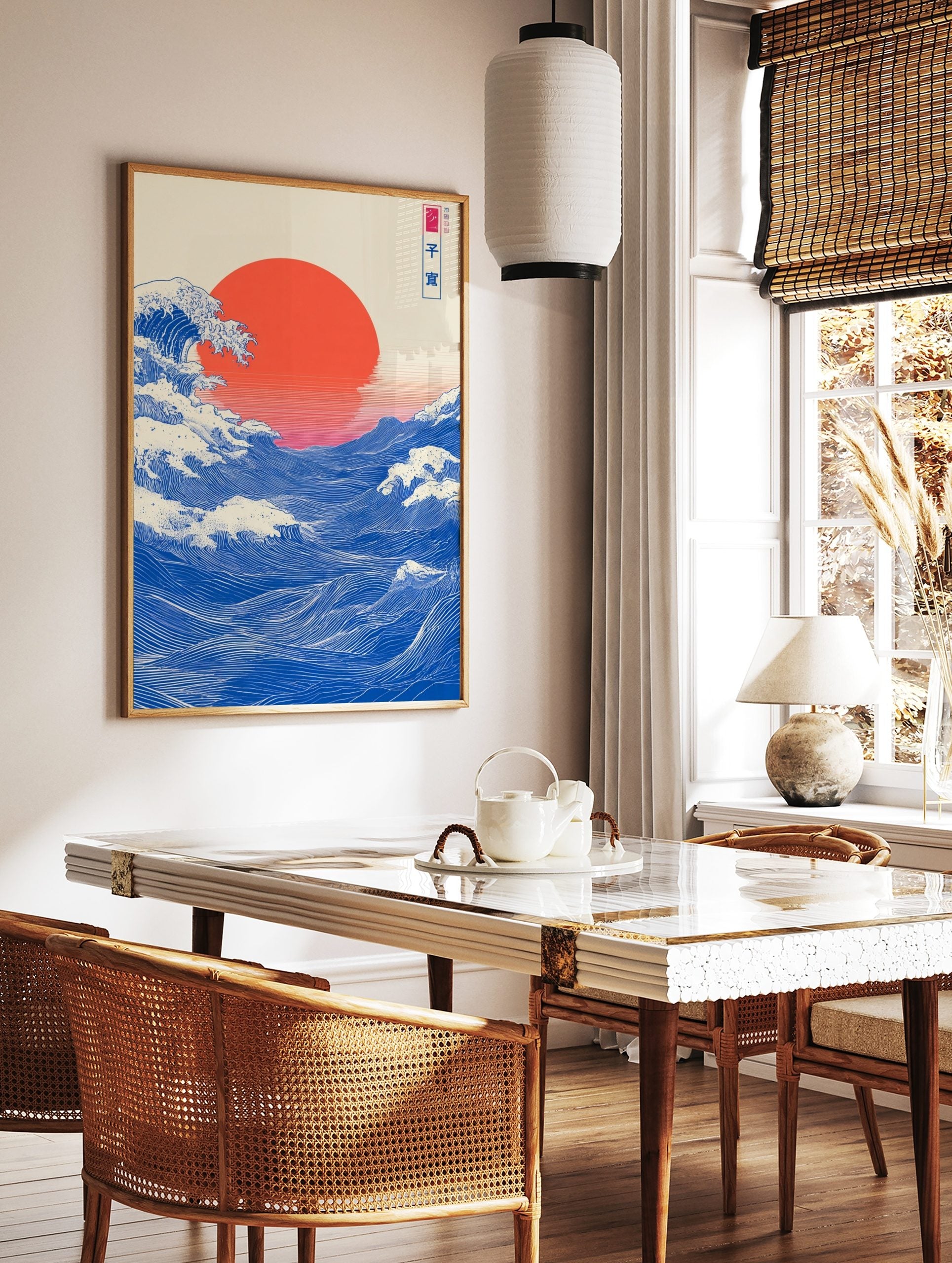 Japanese Ukiyo-e style ocean wave art print with large red sun and blue water, in a styled room mockup