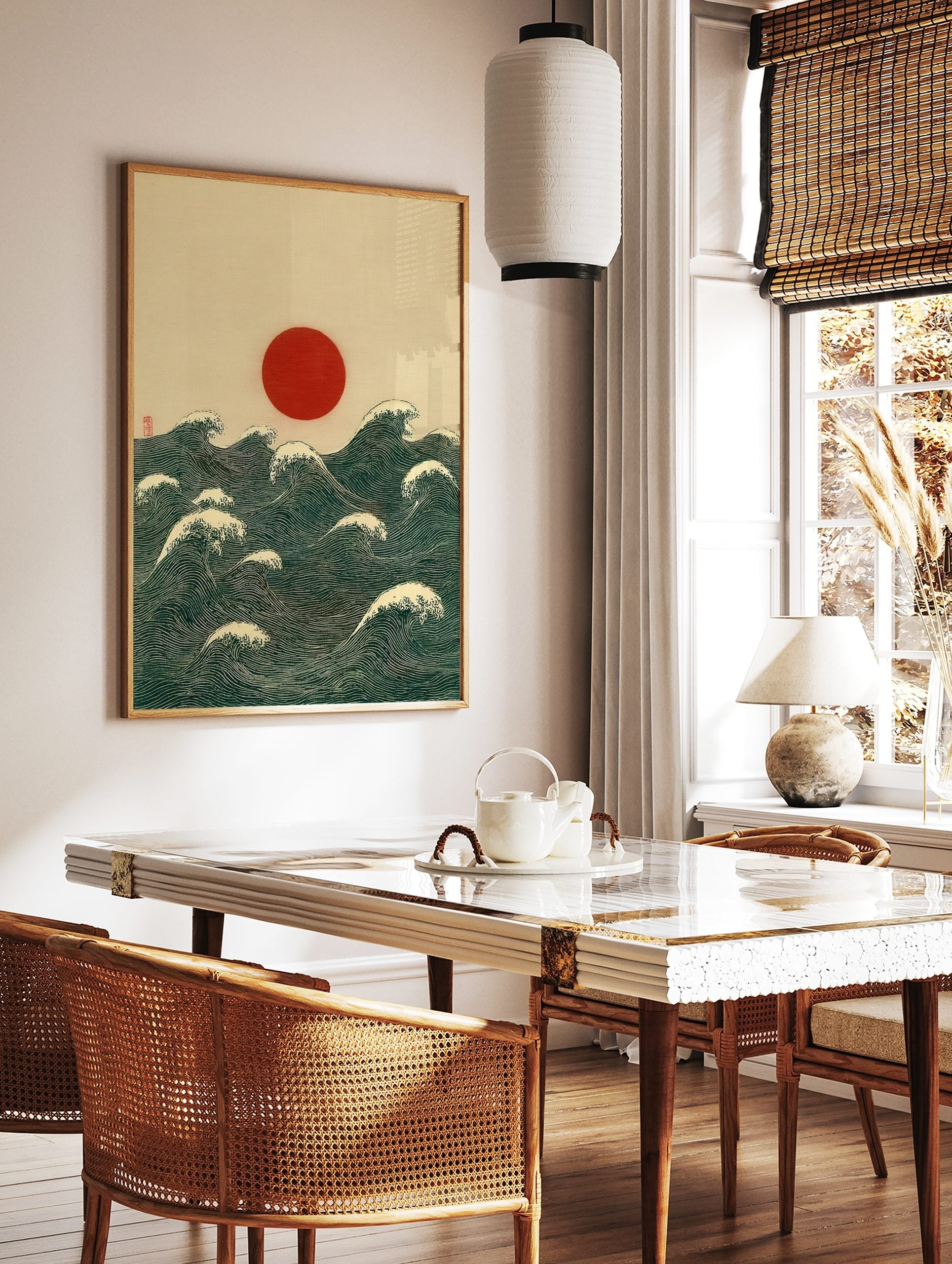 Red sun rising over deep blue-green ocean waves with white crests, Japanese woodblock style print, in a styled room mockup