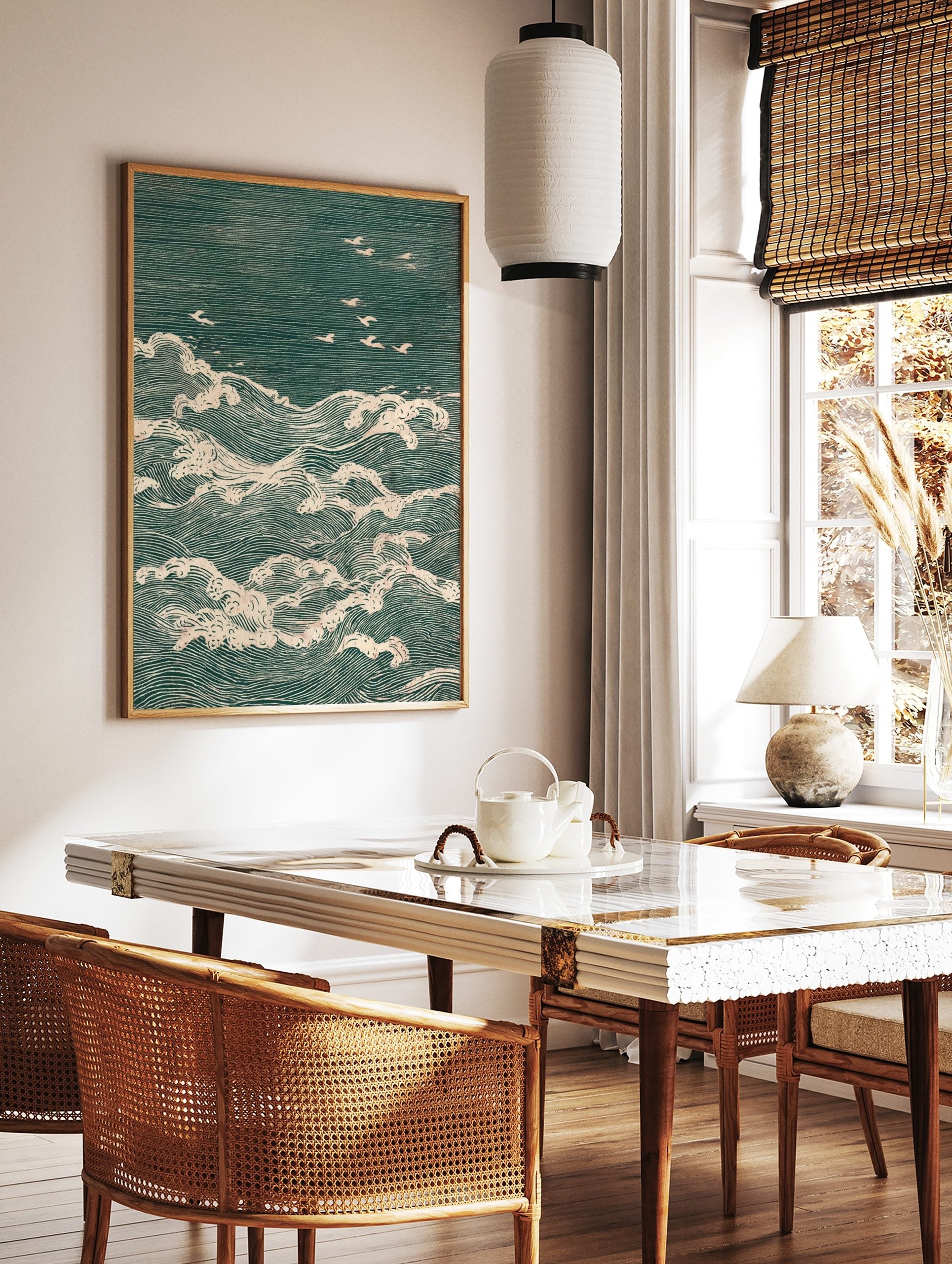 Japanese woodblock print of teal ocean waves with white foam and several white seagulls flying above, in a styled room mockup