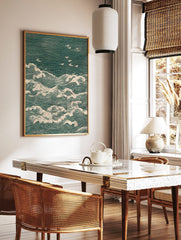 Japanese woodblock print of teal ocean waves with white foam and several white seagulls flying above, in a styled room mockup