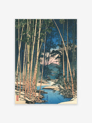 Japanese woodblock print of a serene bamboo forest in winter with a blue stream and snowy ground.