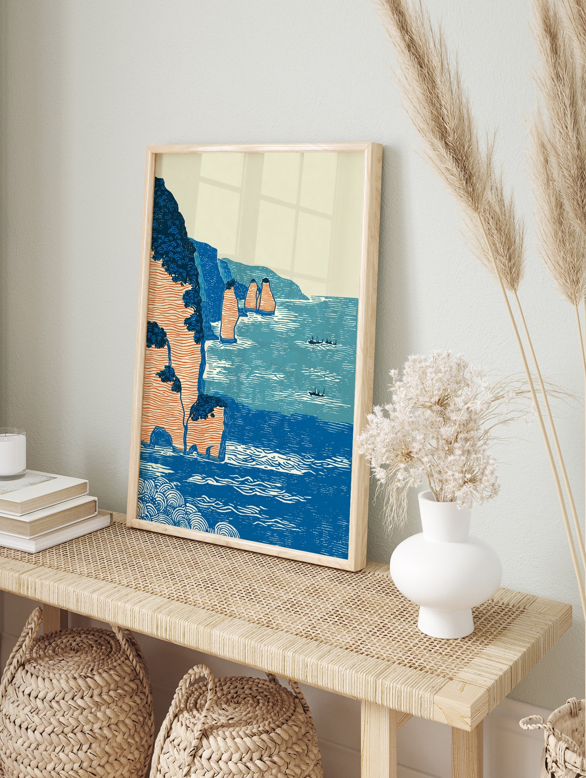 Japanese woodblock print of a coastal landscape with blue ocean, orange cliffs, sea stacks, and small boats. - Image 3