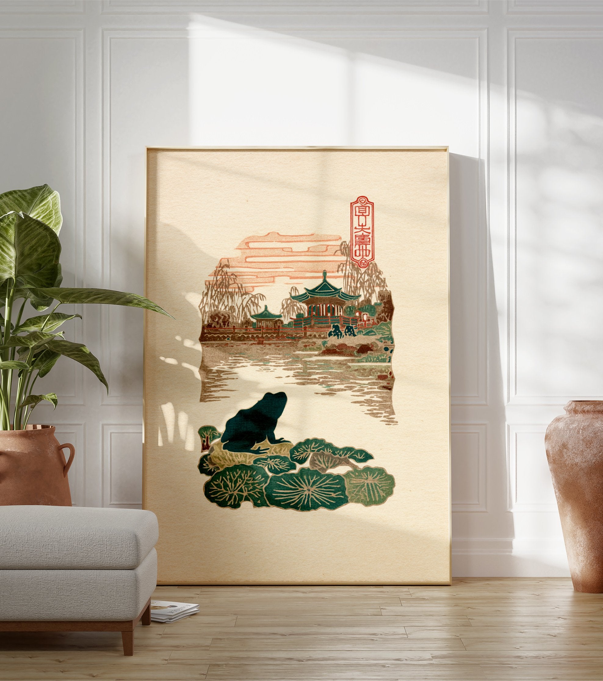 Dark green frog on lily pads in a Japanese woodblock print, with pagodas and mountains in a traditional Asian landscape. - Image 3