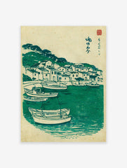 Vintage Japanese woodblock print of a green coastal fishing village with boats in the water and houses on a hill.
