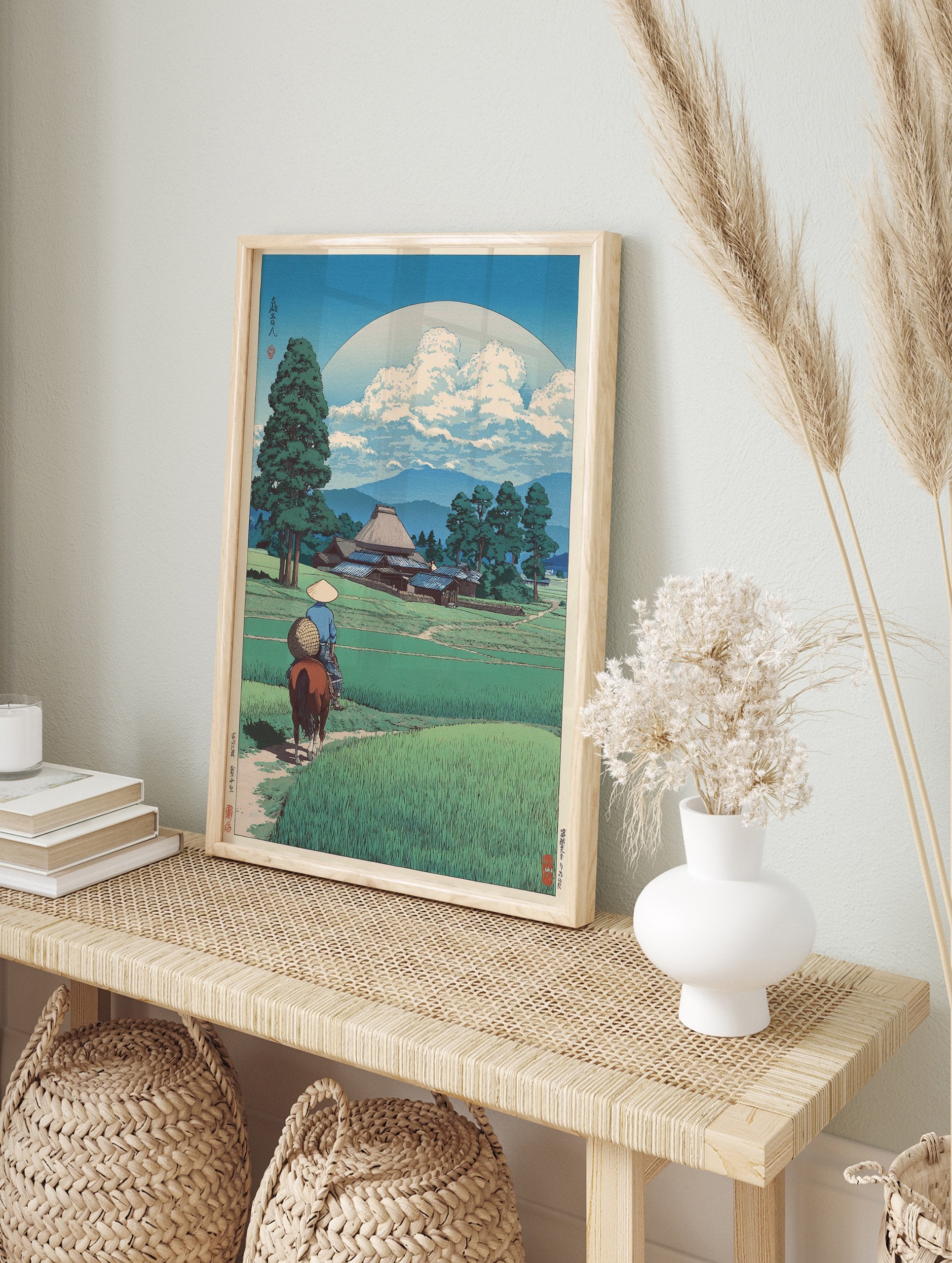 Traditional Japanese woodblock print of a horse rider in rice paddies with a village, mountains, and large moon/sun. - Image 3