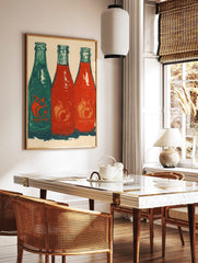 Three Jarritos soda bottles, one green and two red, with fruit motifs and 'JARIITOS' text, in a, in a styled room mockup