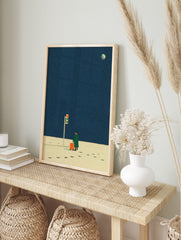 Illustrative print of a person with orange suitcase at traffic light under a deep blue starry, in an alternate framed mockup