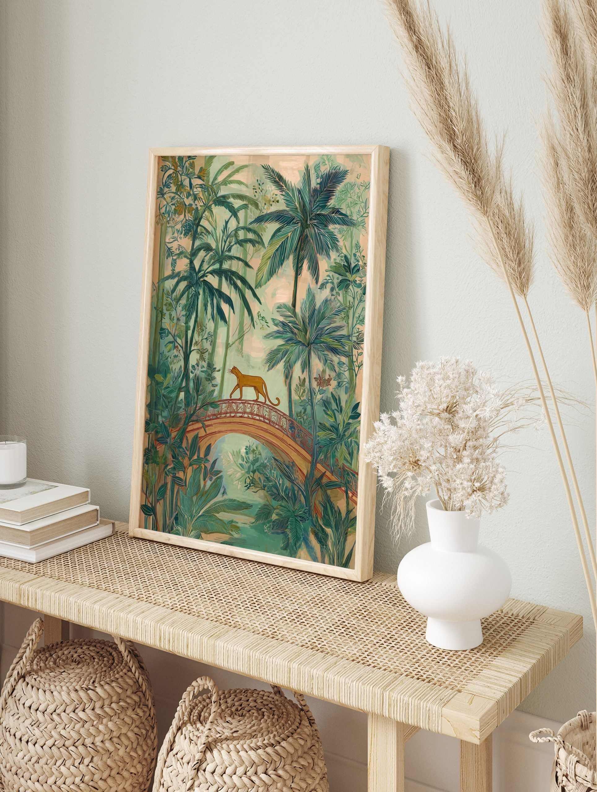 Illustrative jungle art print with a ginger big cat walking on an arched bridge amidst green, in an alternate framed mockup