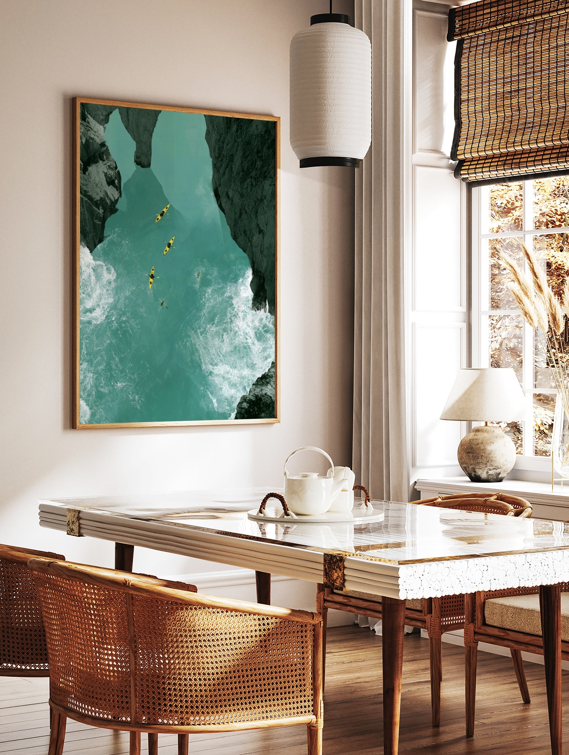 Aerial view of four yellow kayaks on a turquoise river canyon with dark rocky cliffs and white water, in a styled room mockup