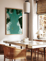 Aerial view of five yellow kayaks on a turquoise river between dark craggy rocks, nature wall art, in a styled room mockup