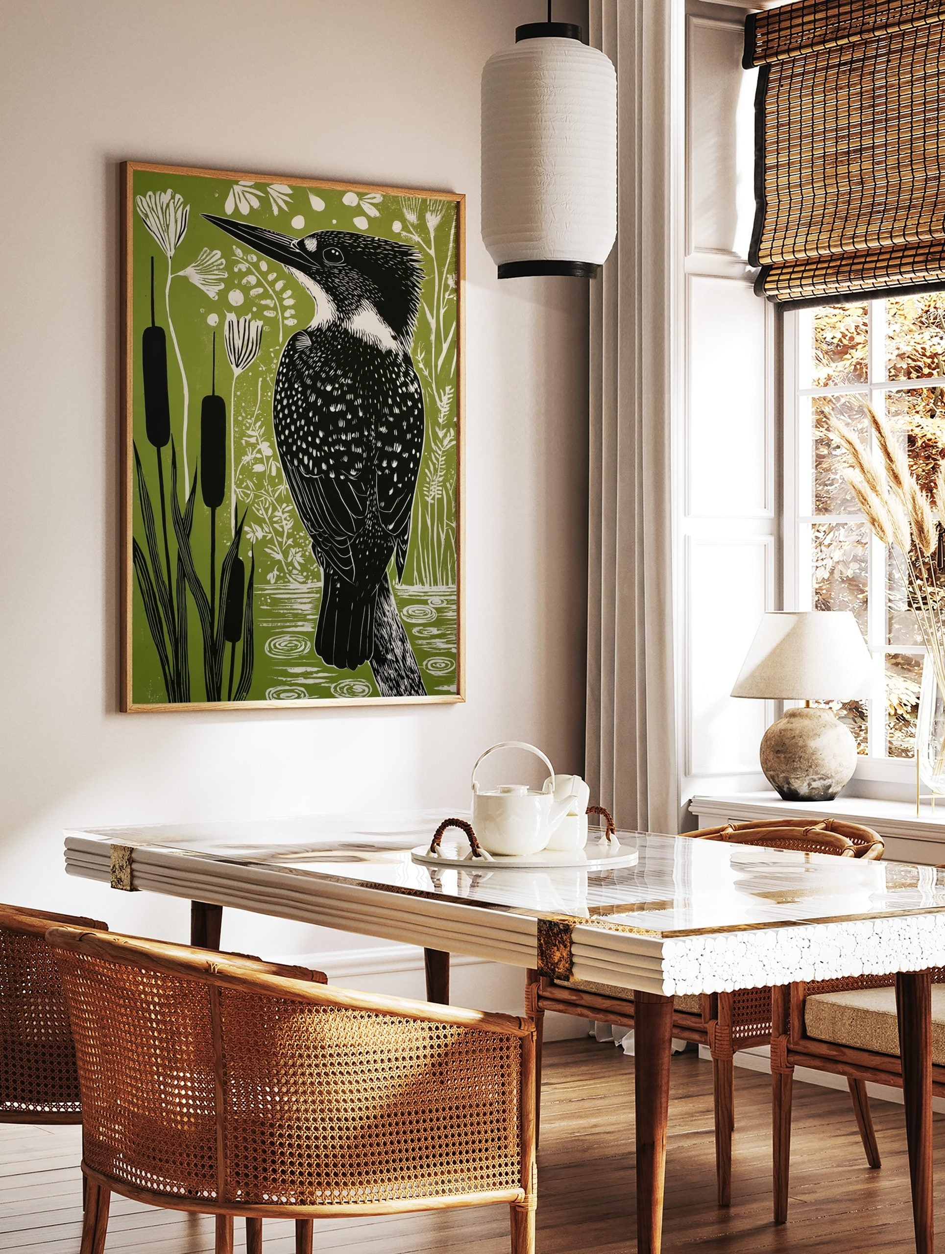 Kingfisher bird illustration in black and white against a green background with cattails and, in a styled room mockup