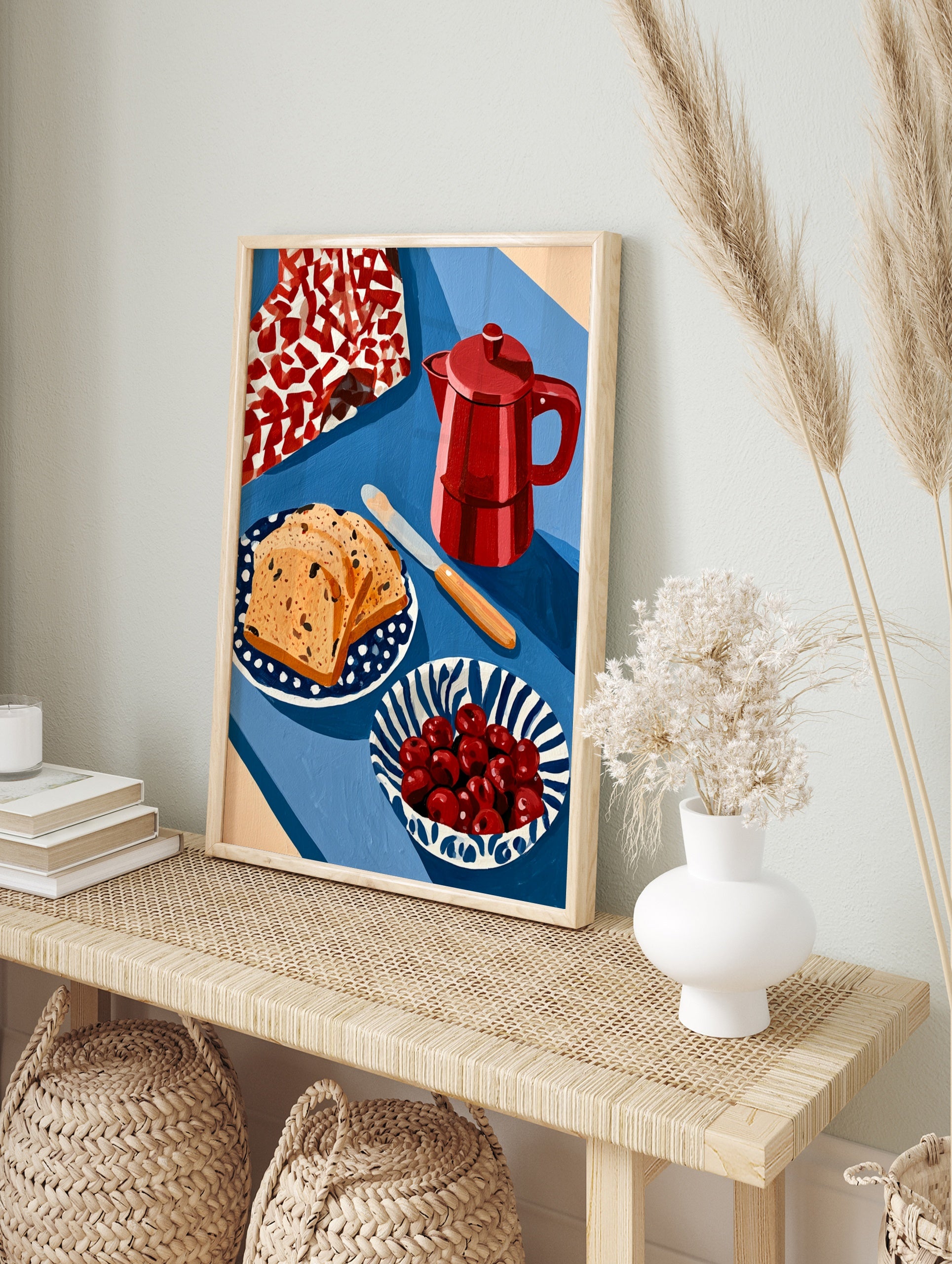Still life wall art print featuring a red moka pot, fruit bread slices, and a bowl of, in an alternate framed mockup