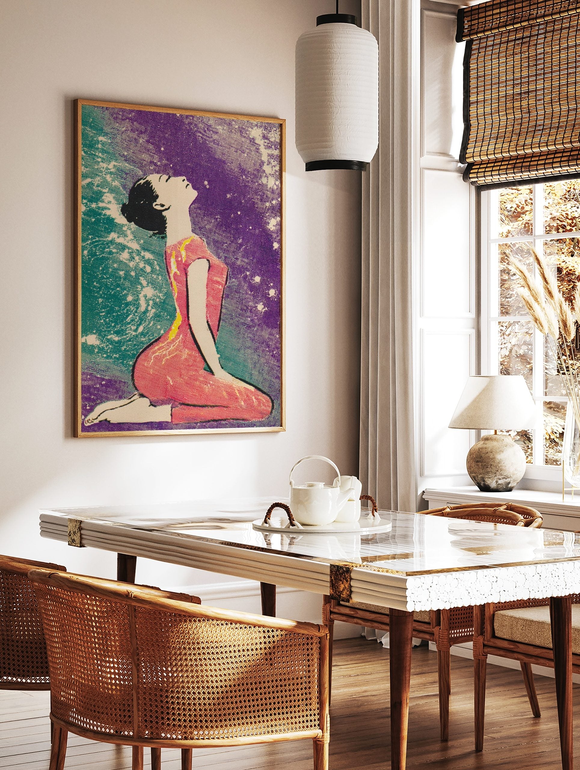 Illustrative print of a woman kneeling, looking up, with a pink outfit and a purple and teal, in a styled room mockup