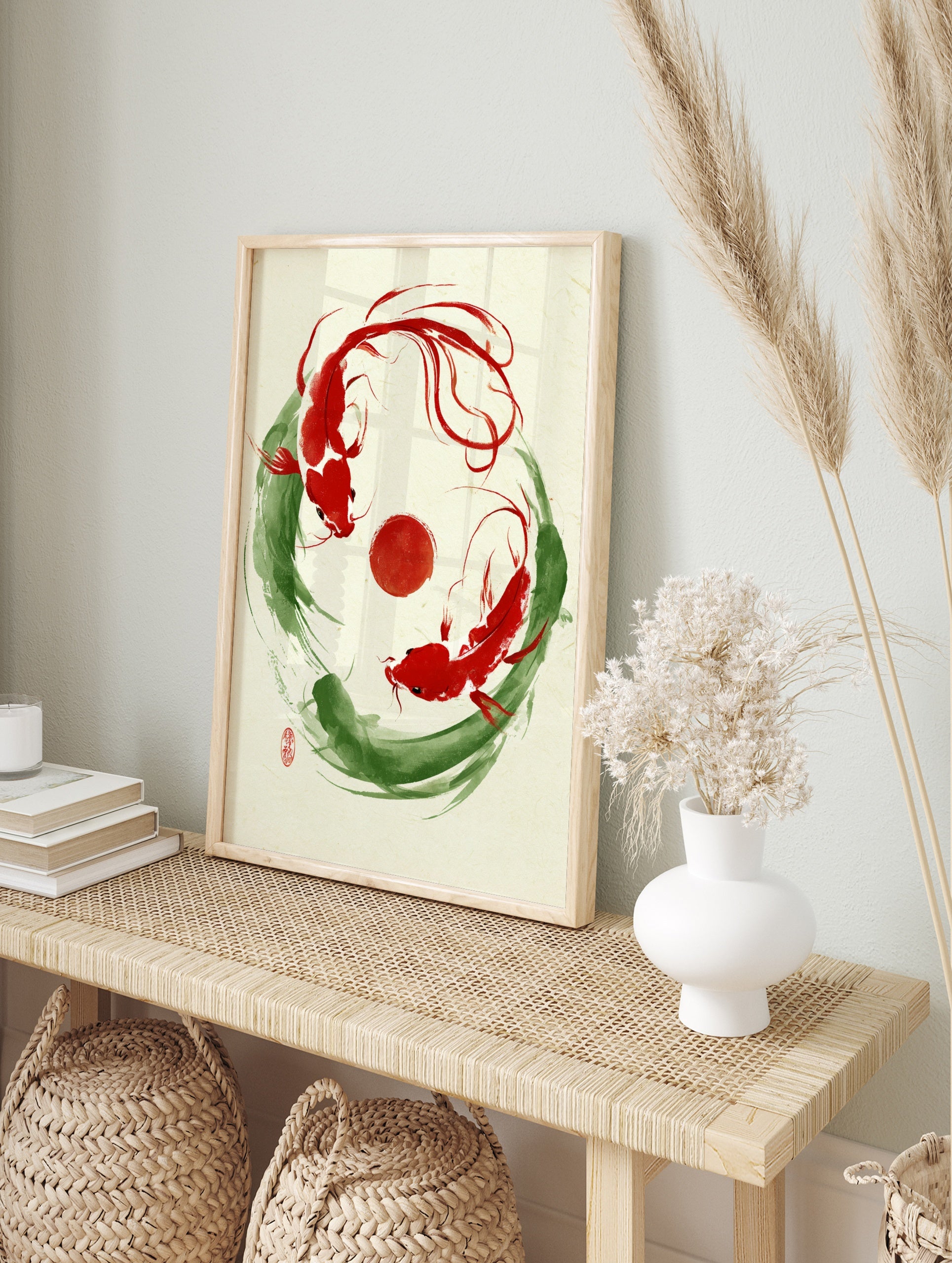 Japanese ink style koi carp wall art with two red fish in a circular green brushstroke frame, in an alternate framed mockup