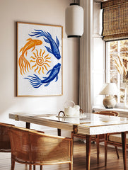 Illustrative koi fish in blue and orange swimming in a circle around a yellow sun on white, in a styled room mockup