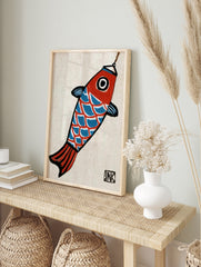 Stylized koi fish illustration with red head, blue scales, and black outlines, hanging from a, in an alternate framed mockup