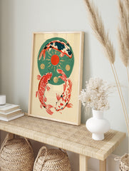 Three koi fish in a circular formation around a red sun and gold circles on a green background, in an alternate framed mockup