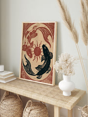 Japanese-style koi fish art print with red and black fish circling a central sun on a, in an alternate framed mockup