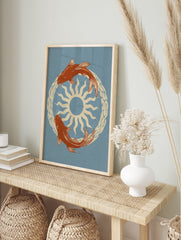 Illustrative koi fish swimming in a circle around a central sun, cream and orange on dusty, in an alternate framed mockup