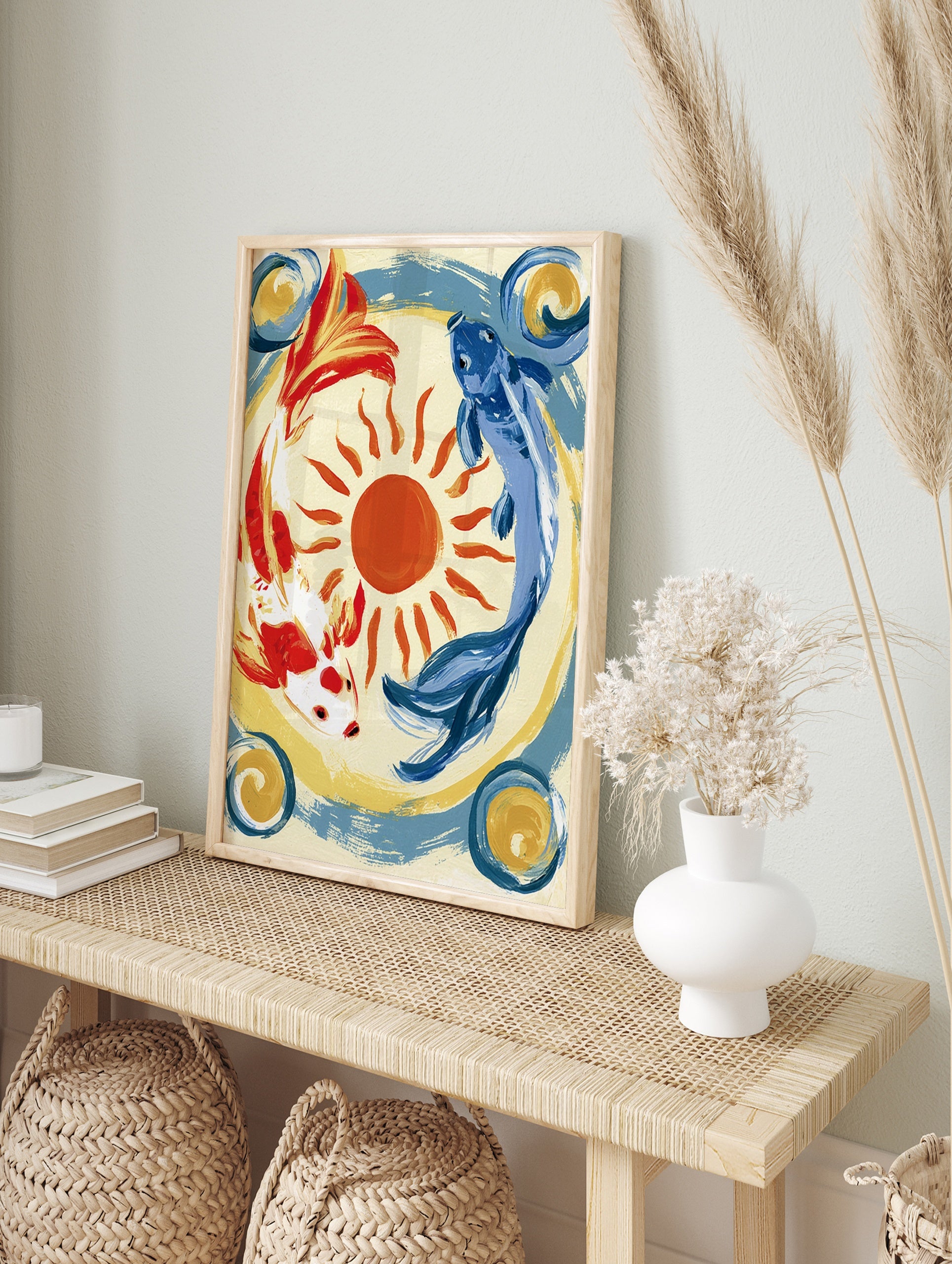Koi fish wall art featuring red and blue koi circling a sun on a cream background with blue, in an alternate framed mockup