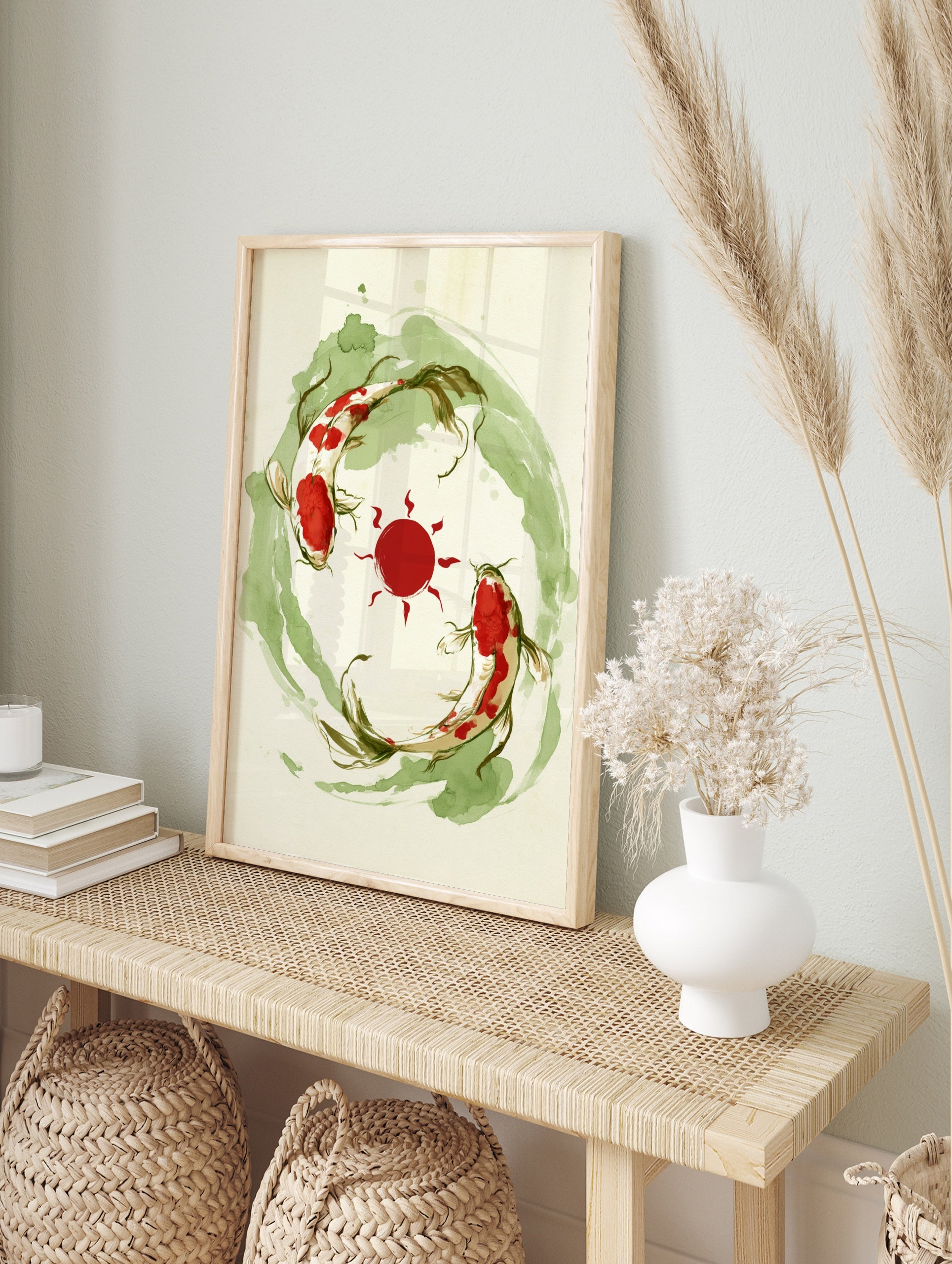 Koi fish wall art print featuring two fish swimming around a red sun with green watercolour, in an alternate framed mockup