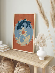 Koi fish yin yang composition with a central sun illustration on a terracotta orange, in an alternate framed mockup