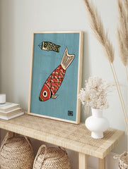 Illustrative Koinobori wall art print featuring red and green Japanese carp streamers on a, in an alternate framed mockup