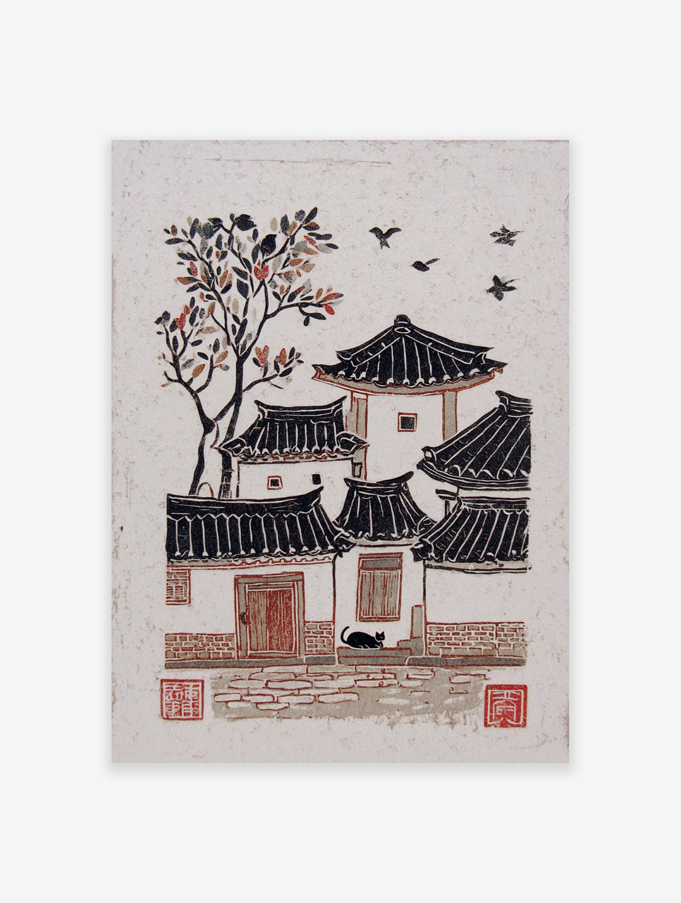 Woodcut print of a traditional Korean village with Hanok houses, a tree with red leaves, black cat, and flying birds.