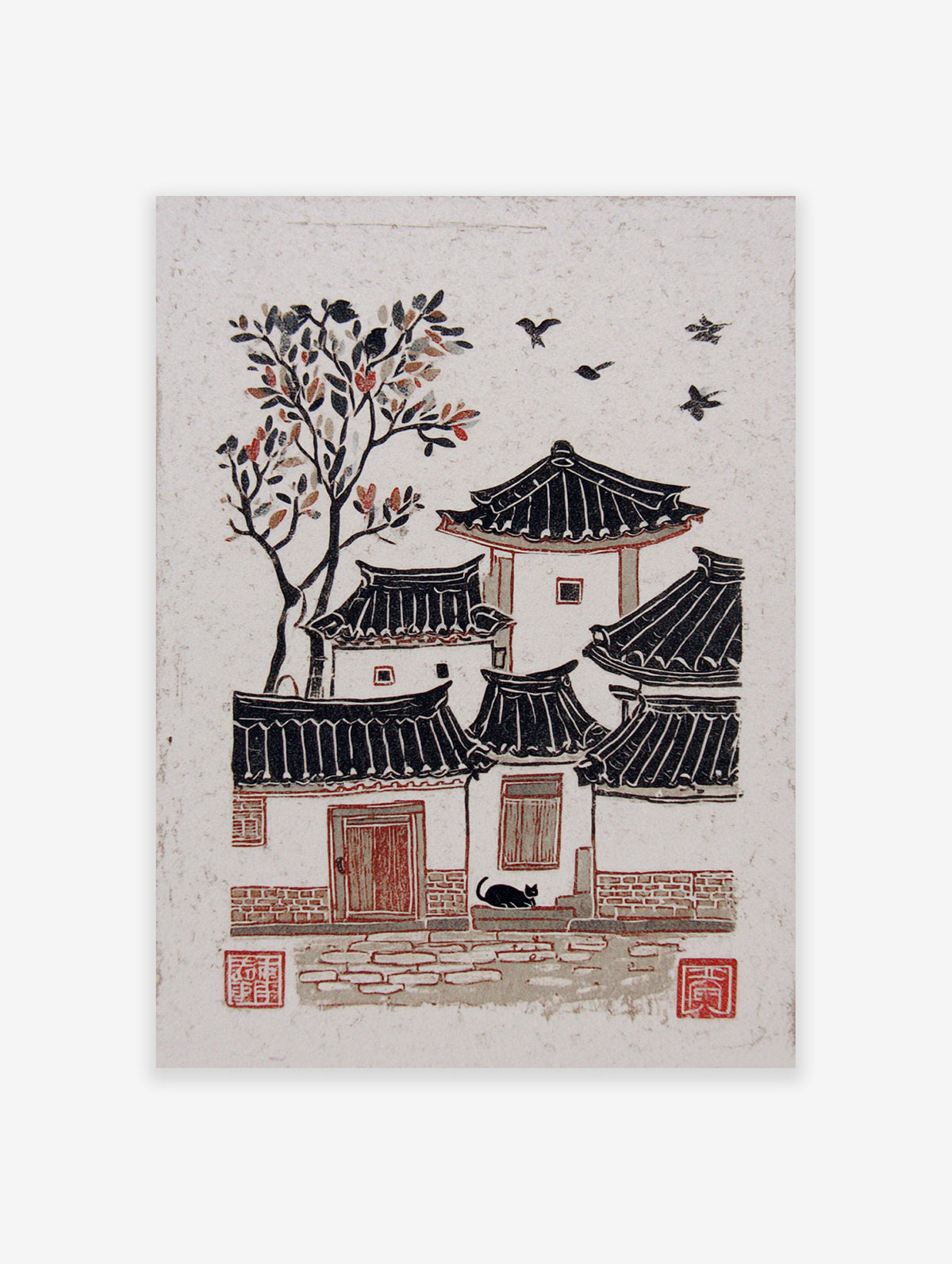 Woodcut print of a traditional Korean village with Hanok houses, a tree with red leaves, black cat, and flying birds.