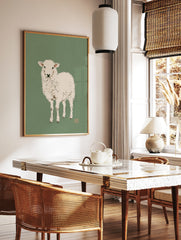 Minimalist illustration of a white lamb on a muted green background, art print, in a styled room mockup