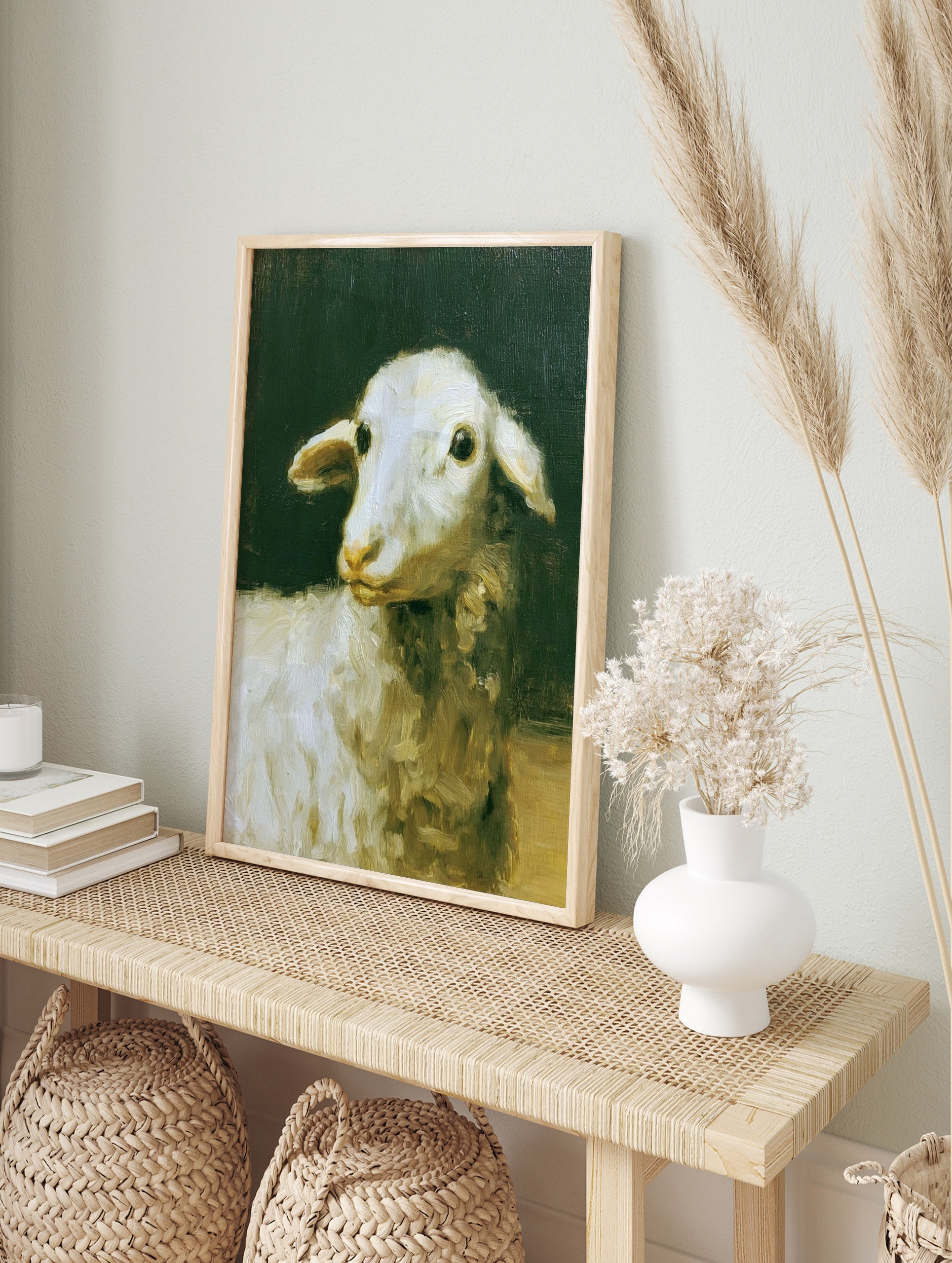 Oil painting style art print of a white lamb against a dark, moody background, in an alternate framed mockup