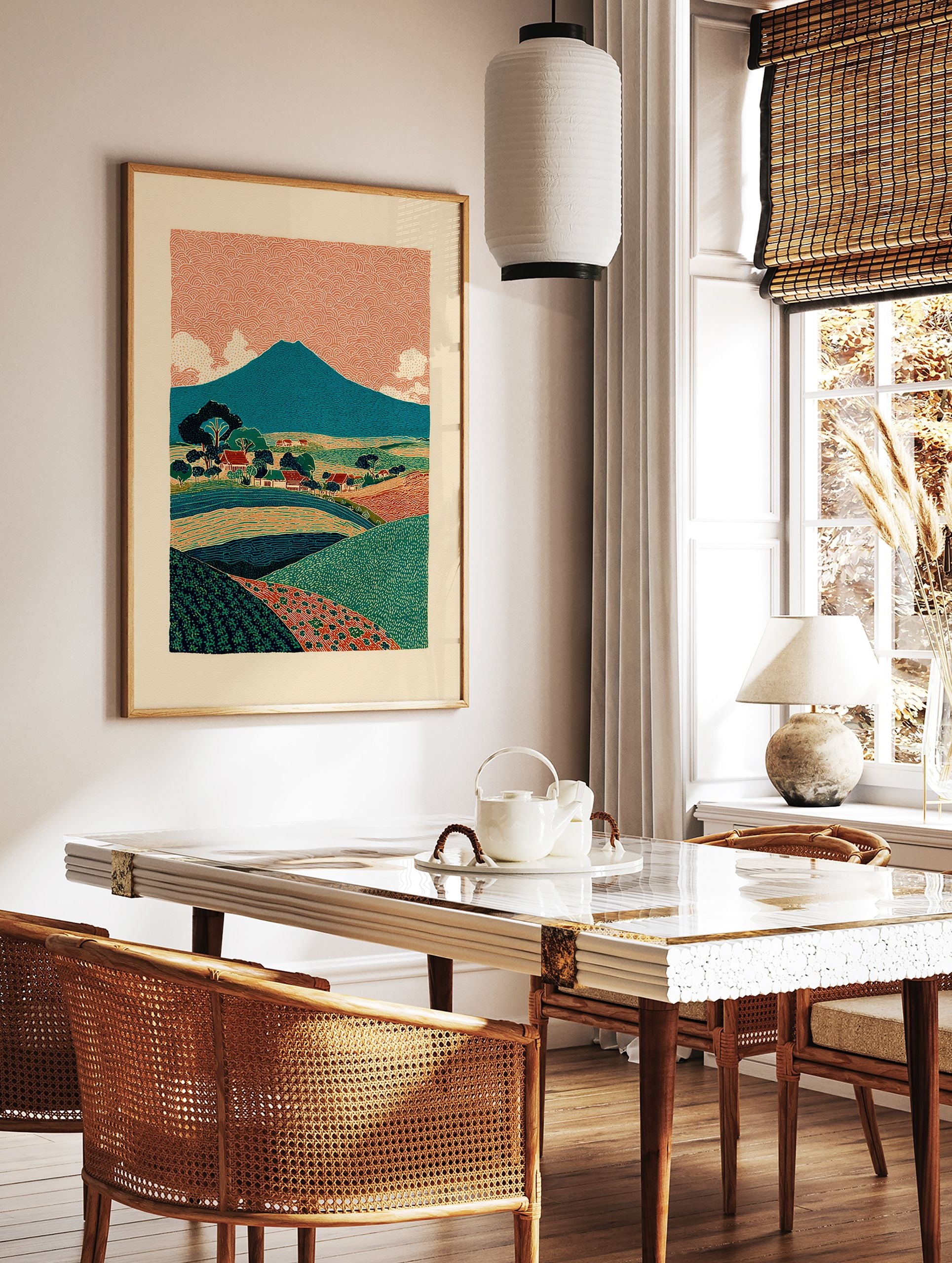 Illustrative landscape poster depicting a blue mountain, orange patterned sky, green fields, and a small village. - Image 2