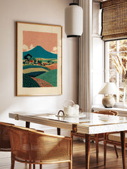 Illustrative landscape poster depicting a blue mountain, orange patterned sky, green fields, and a small village. - Image 2