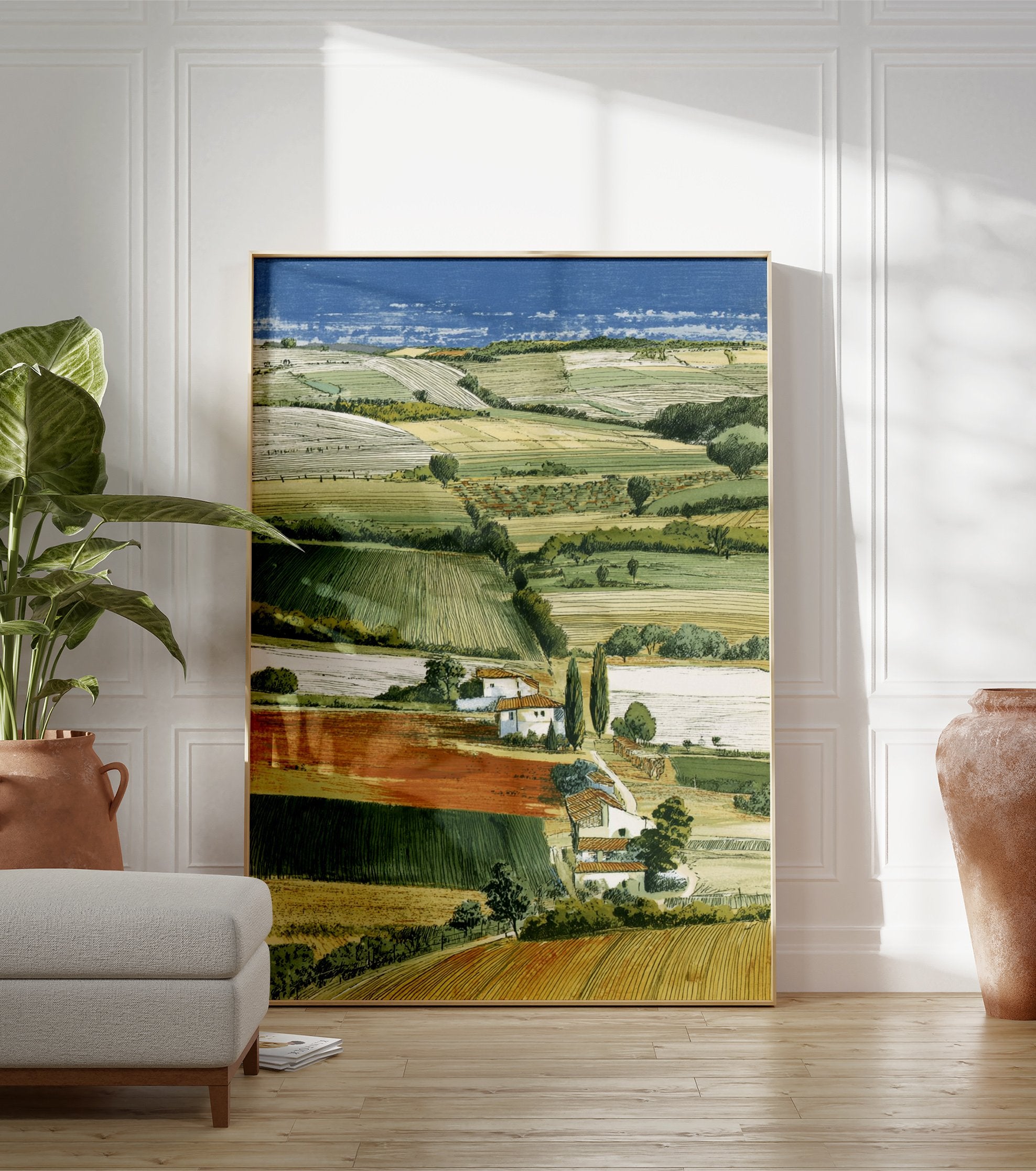 Illustrated landscape art print showing rolling green and yellow fields, white houses, cypress trees, and a distant blue sea. - Image 3