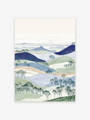 Illustrated landscape wall art with layered blue and green hills, bare trees, and a pale sky.
